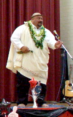 Liko Puha chanting a blessing at a Hew Len/Tung Loong graduation luau