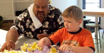Liko Puha teaching lei making at Family Day
